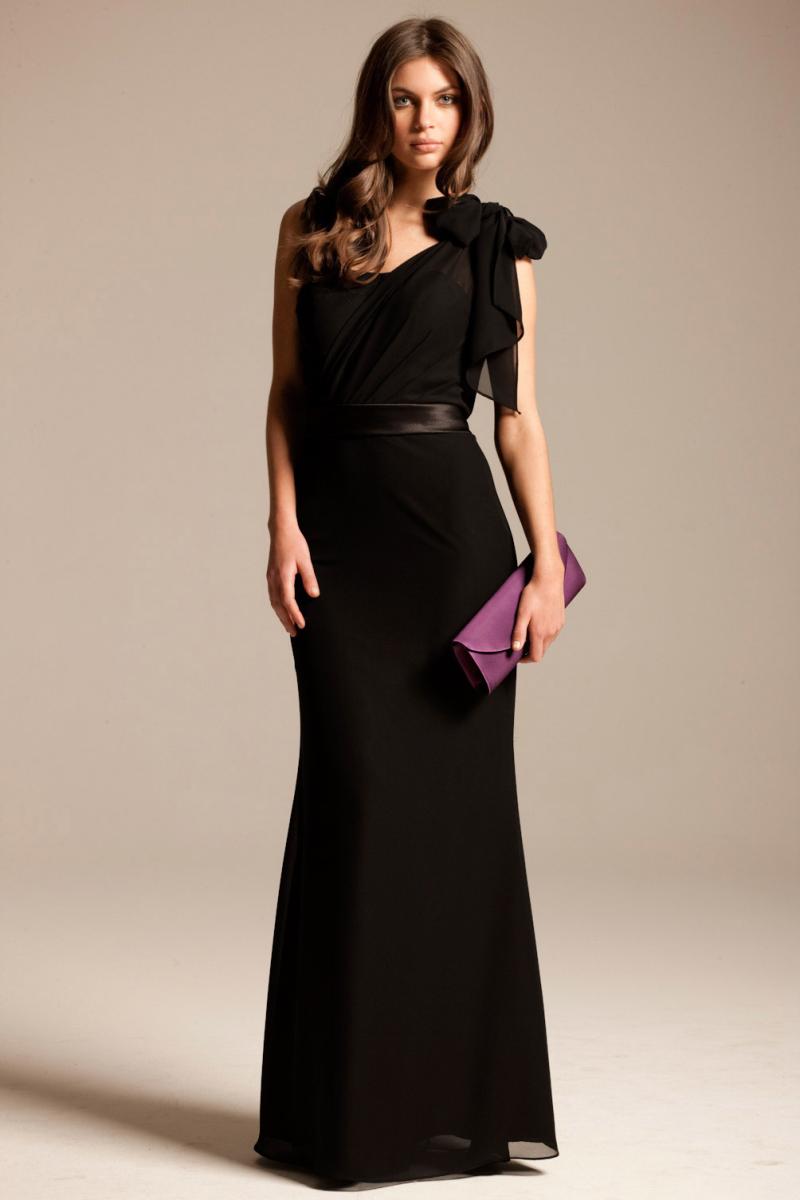 Wearing a long black dress dresses